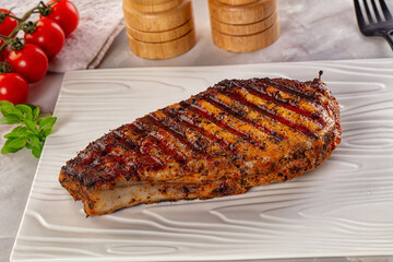 Grilled pork steak with bone