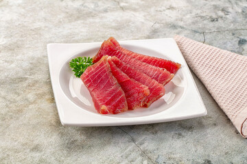 Raw red tuna sashimi slices