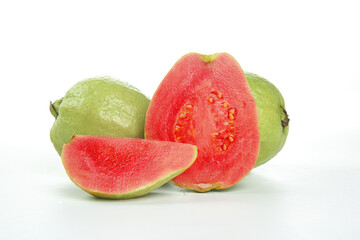 Fresh Red Guavas Sliced Showing Pink Flesh - Tropical Fruit on White Background