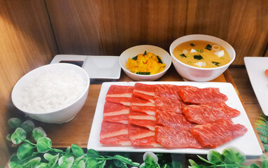 A tantalizing Korean culinary experience featuring marbled beef rice and other delicious dishes.