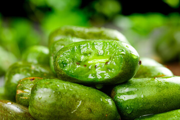 Fresh Mini Kiwi Berries with Water Droplets - Natural Organic Fruit Close-up