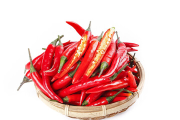 Freshly Picked Red Chili Peppers in Wicker Basket with Seeds Visible for Spicy Cooking Ingredients