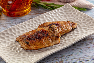 Roasted pork schnitzel steak piece
