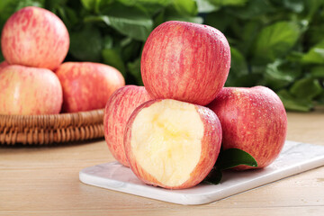 Fresh Red Fuji Apples from Shandong Luochuan China on White Cutting Board with Natural Light