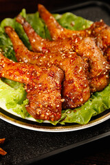 Roasted Rabbit Leg Dishes with Herbs and Spices on Lettuce Garnish - Gourmet Meat Cuisine