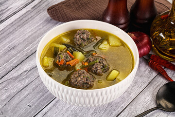 Soup with beef meatballs and vegetables