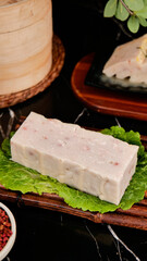 Traditional Chinese White Tofu Cake with Meat Ingredients and Bamboo Steamer Hot Pot Specialties Setup