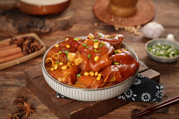 Chinese Braised Pork Feet with Soy Sauce and Corn - Traditional Asian Comfort Food Dish