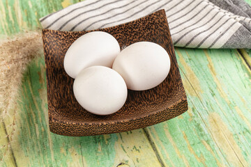 Raw white uncooked chicken eggs