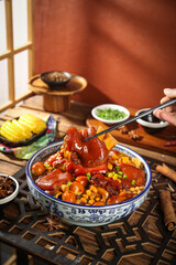 Chinese Braised Pork Trotters with Soybeans and Corn - Traditional Asian Comfort Food Dish