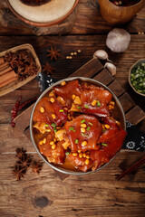 Red braised pork trotters with soybeans - traditional Chinese stewed dish with spices