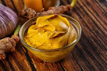 Indian yellow spicy curry sauce