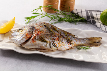 Baked dorada fish with spices