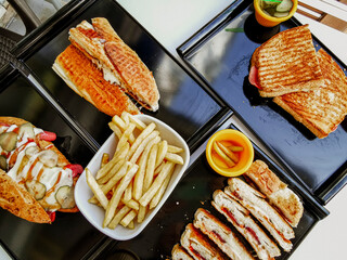 Delicious meat kebab with fresh vegetable salad served with variety of Turkish dishes and appetizers. Top view of assorted Turkish food and meze, tasty and healthy Mediterranean cuisine. Top view.