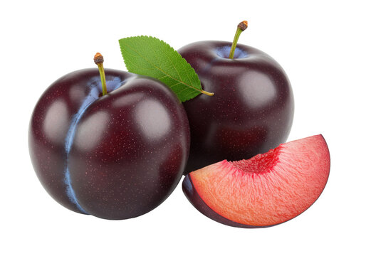 Isolated group of fresh plums with slice and green leaf, whole and cut fruit, healthy dessert