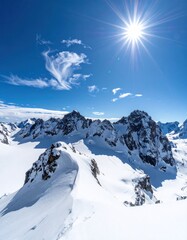Snow-capped mountains under a brilliant sun, fluffy clouds dotting the bright blue sky. Pristine white snow covering all surfaces
