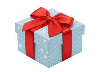 Isolated gift box with red ribbon and bow, blue paper with dots pattern, festive season, gift-giving