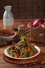 Traditional Stir-Fried Seaweed with Red Peppers and Vegetables Asian Cuisine