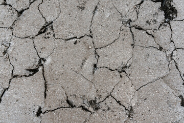Raised destroyed asphalt, pieces of concrete