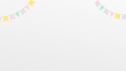 パステルカラーの旗が飾られたシンプルな背景