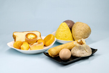 Close-up food on plates, shaomai, wowotou, cakes, white background