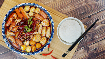 Close-up of hot pot ingredients on wooden table, top view © Wheat field
