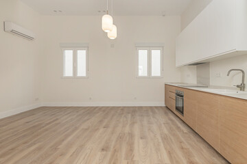 Obraz premium Luxury kitchen with marble countertops, ceiling-high cabinets, and motion-sensor faucets