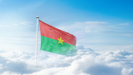 Burkina Faso national flag waving in the sky. Burkina Faso national flag for independence day.
