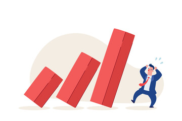 panic businessman watching falling red bar chart