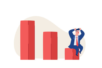 stressed businessman sitting on the lowest declining bar chart