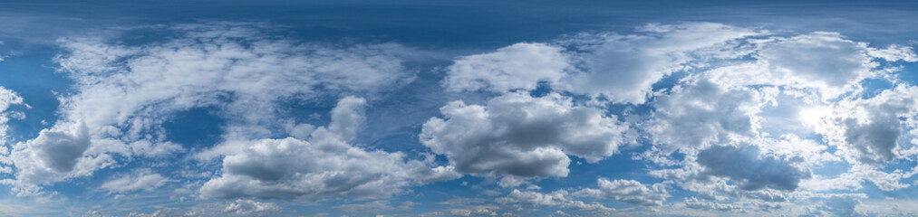 Blue sky panorama with Cirrus clouds in Seamless spherical equirectangular format. Full zenith for use in 3D graphics, game and editing aerial drone 360 degree panoramas for sky replacement.