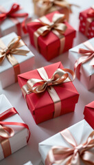 Obraz premium Red gift box with golden ribbon and festive wrapped presents