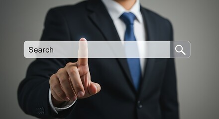 Person Touching Search Bar Wearing Dark Business Suit and Blue Tie