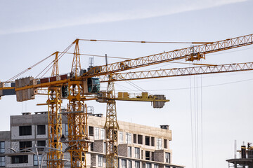 Tower Crane on formworks. Crane and building construction. Construction crane on Housing. Construction site, Multi Storey Residential Buildings construction.
