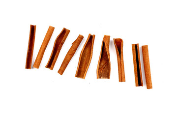 Dried cinnamon sticks arranged in a bundle.