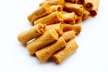 Rolled crispy wafers filled with shredded pork floss, Thai snack.