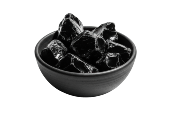 Rugged dark stoneware bowl holding jagged unpolished black obsidian fragments, isolated on transparent background with dramatic shadows, minimalist studio shot, raw geological power and elemental