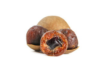 Putian Dried Longan Fruits on Wooden Spoon White Background Chinese Traditional Healthy Snack Food