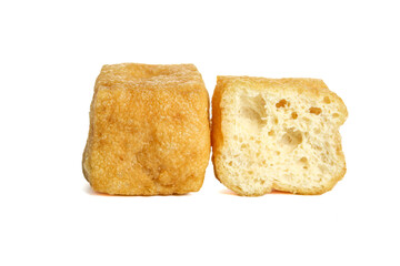 Fried Tofu Cubes with Crispy Golden Exterior and Soft Hollow Interior on White Background
