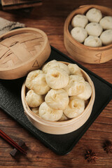 Traditional Chinese Xiao Long Bao Dumplings in Bamboo Steamers - Freshly Made Asian Cuisine