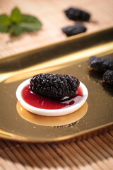 Dried Xinjiang Mulberry with Red Sauce Traditional Chinese Herbal Tea Ingredient Closeup