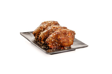 Spicy Marinated Rabbit Head Traditional Chinese Shuangliu Cuisine Dish on Black Plate