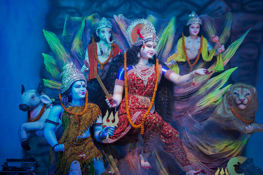 Durga family idol with Shiva Ganesha Kartikeya, Navratri Durga maa family statue, Hindu divine family sculpture, Durga puja decoration with full family stock photo.