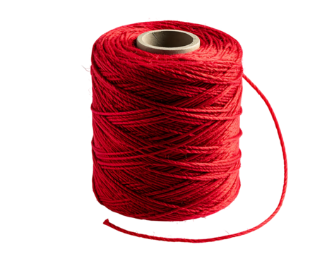 A spool of vibrant red thread, tightly wound, shows a textured surface and a single strand extending from the side against a black background