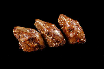 Sichuan Spicy Rabbit Heads with Sesame Seeds - Traditional Chinese Food from Shuangliu