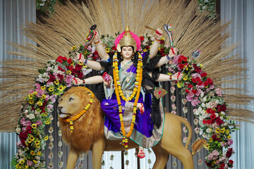 Goddess Durga with lion statue, Hindu goddess Durga idol, Navratri festival Durga maa, Divine Durga...