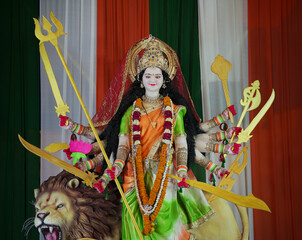 Goddess Durga with lion statue, Hindu goddess Durga idol, Navratri festival Durga maa, Divine Durga mata sculpture stock photo.