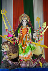 Goddess Durga with lion statue, Hindu goddess Durga idol, Navratri festival Durga maa, Divine Durga mata sculpture stock photo.