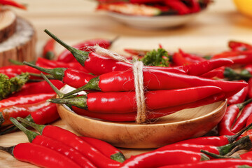Fresh Red Chili Peppers Bundle on Rustic Wooden Bowl Farmhouse Kitchen Setting