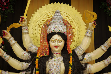 Goddess Durga with lion statue, Hindu goddess Durga idol, Navratri festival Durga maa, Divine Durga mata sculpture stock photo.